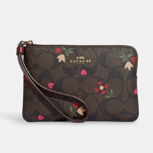 Coach Handbags - Coach Corner Zip Wristlet In Signature Canvas With Heart Petal Print